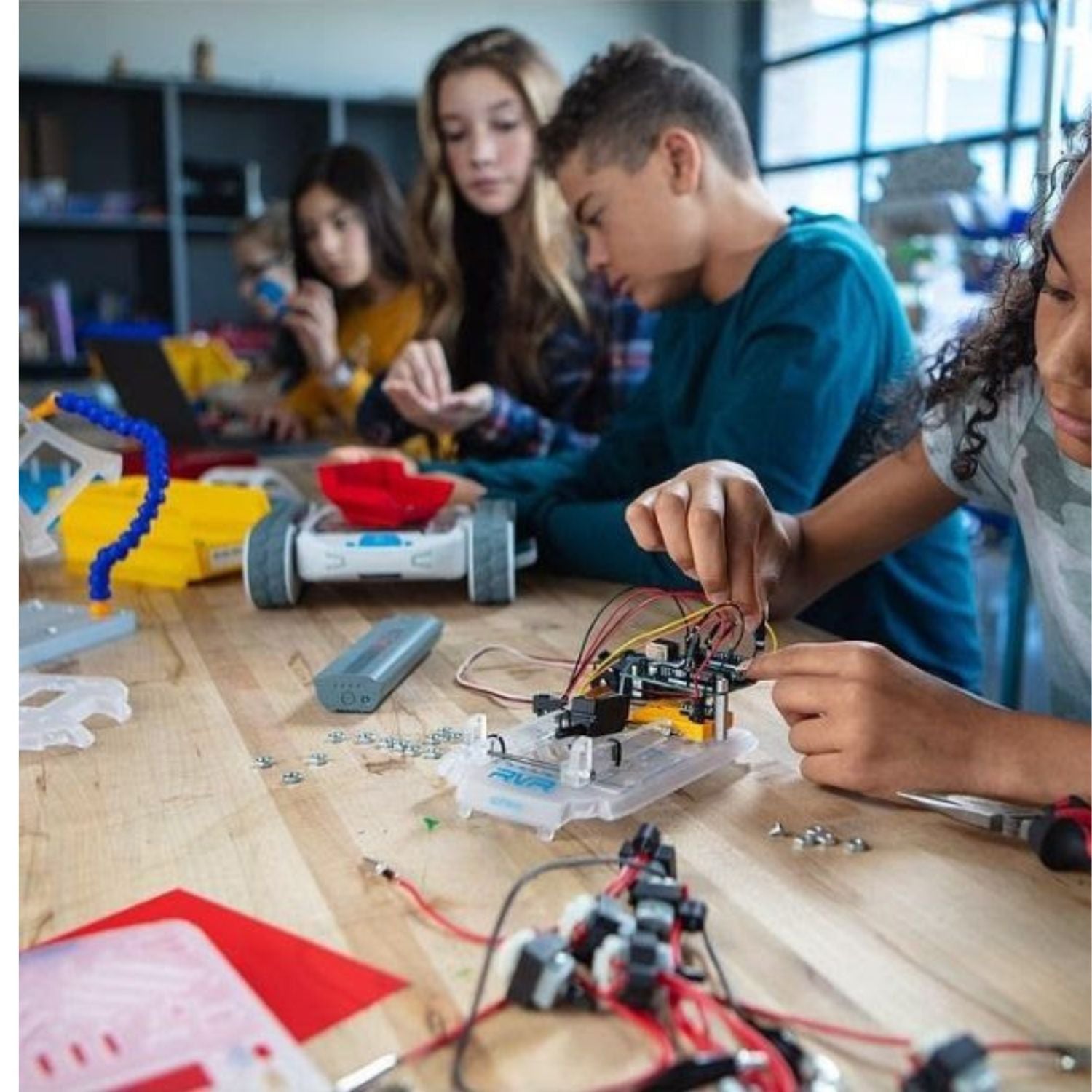 5 teenagers working on sphero rvr+